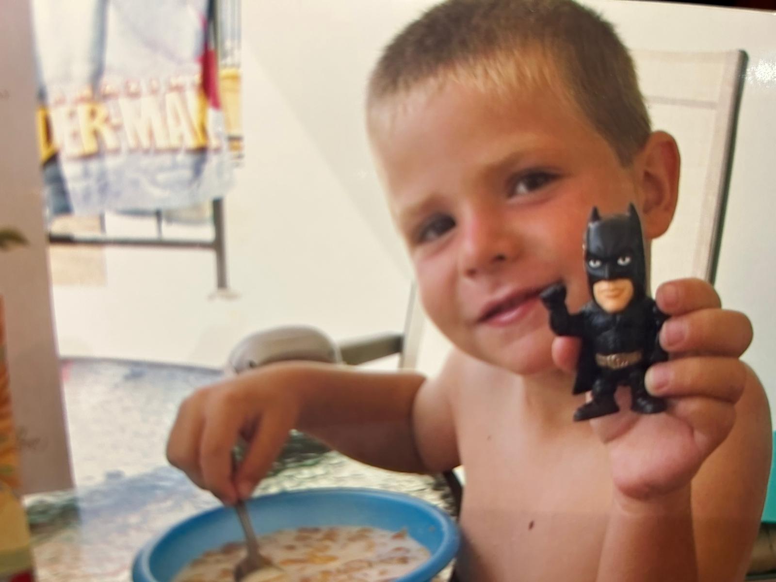 Chris with Batman Toy